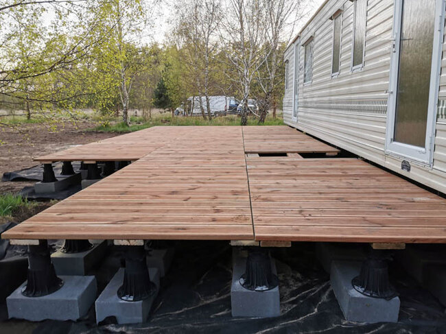 Wood deck on adjustable terrace pedestals